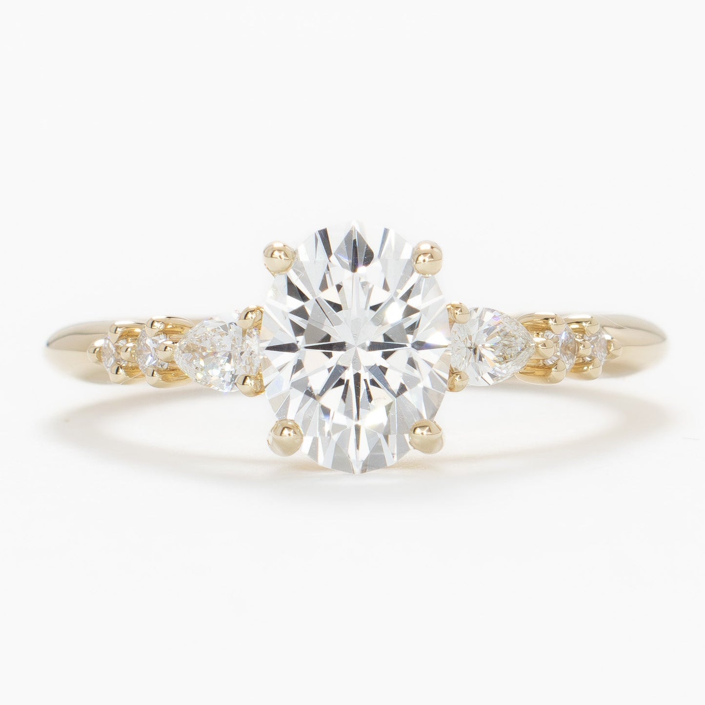 esme engagement ring with white lab sapphire in yellow gold