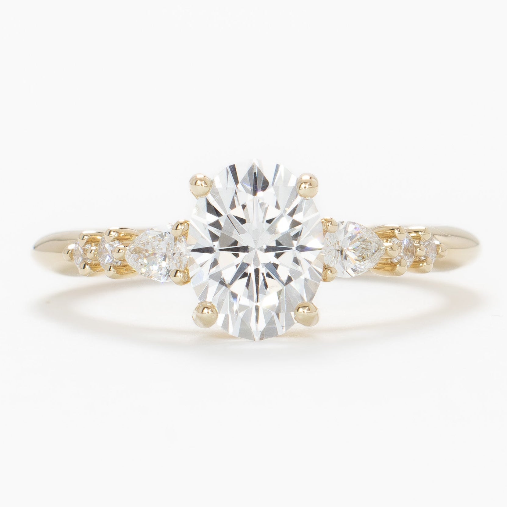 esme engagement ring with white lab sapphire in yellow gold