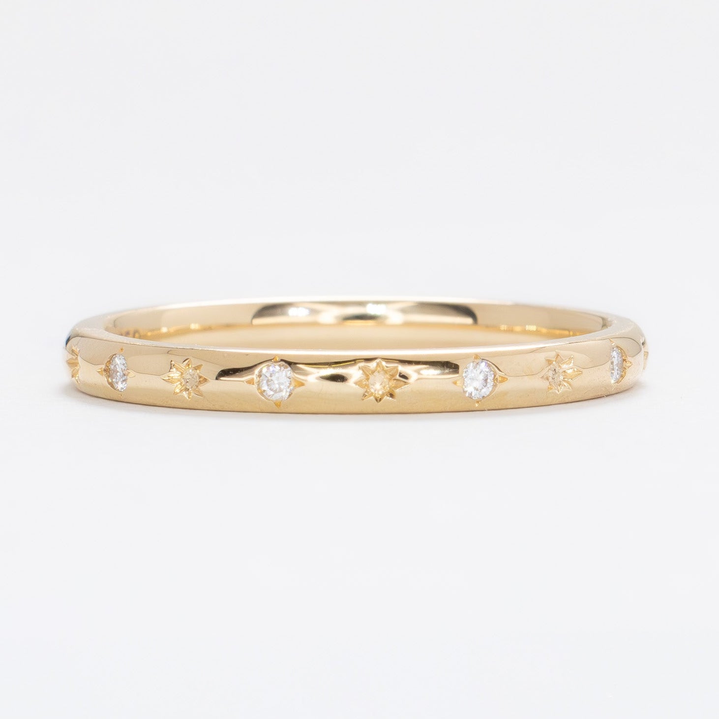 estel band with lab diamond accents in yellow gold