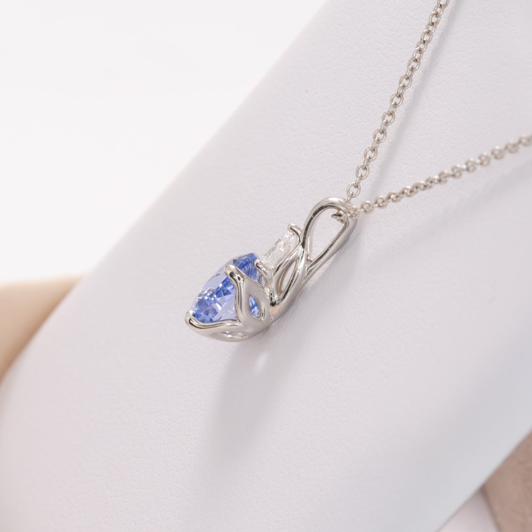esther necklace in white gold with blue oval lab sapphire 