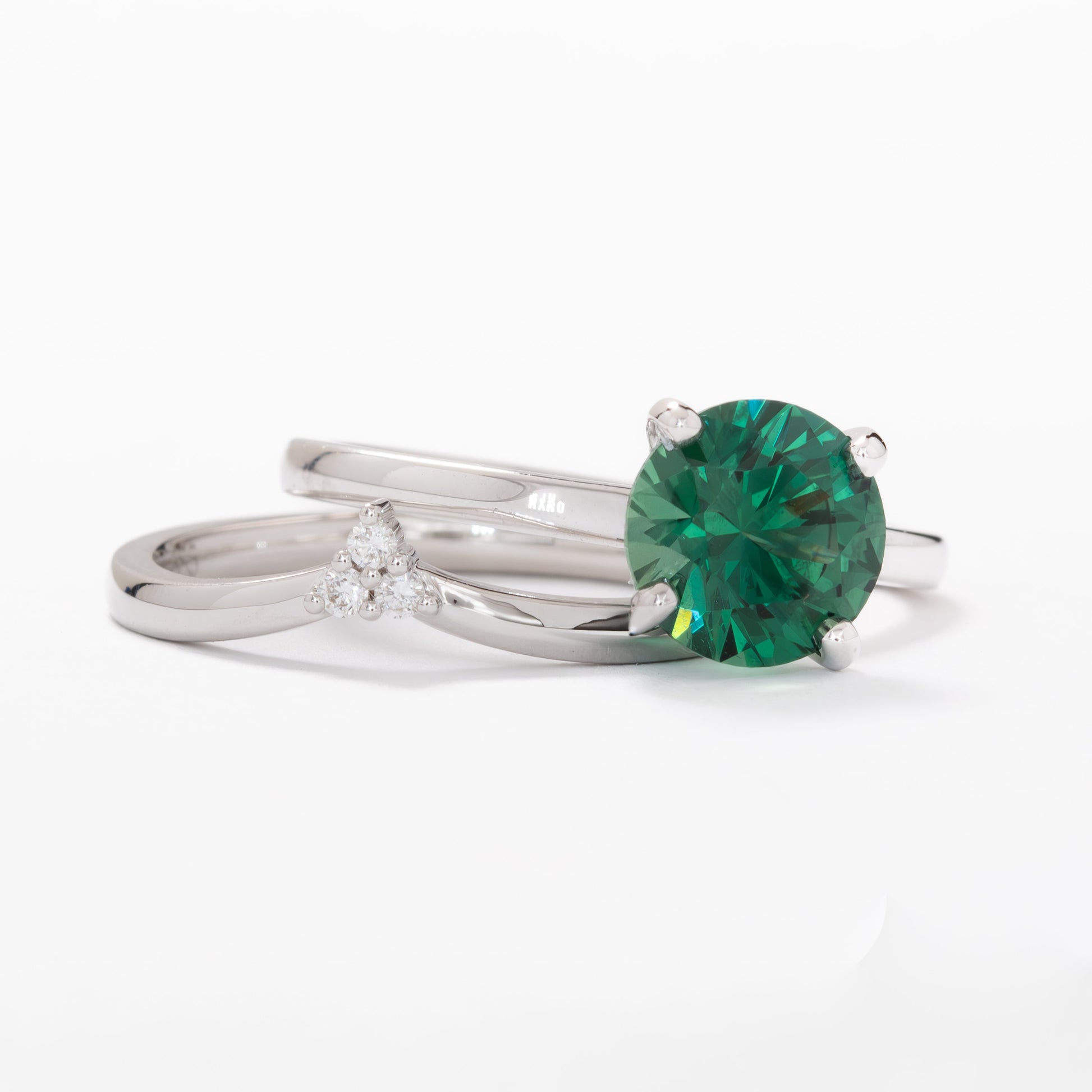 evie engagement ring with green lab sapphire round