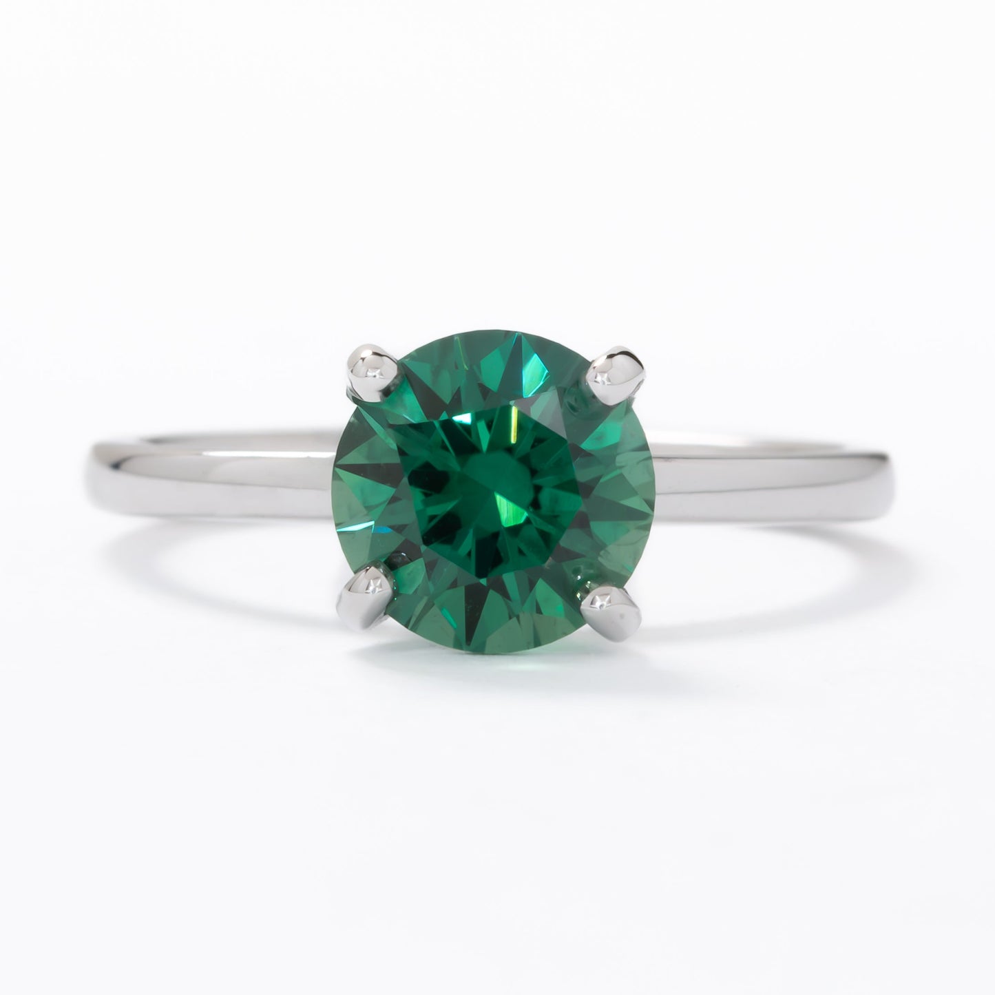 evie engagement ring with green lab sapphire round