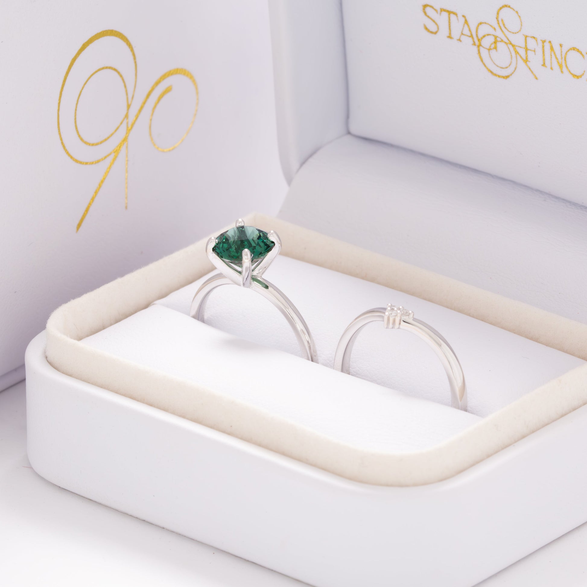 evie engagement ring with green lab sapphire round