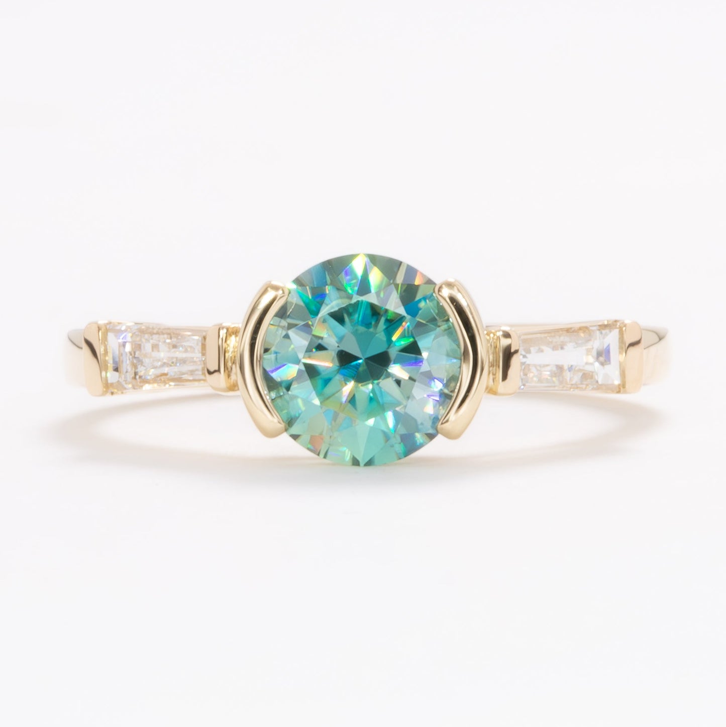 ezri three stone engagement ring with round blue-green moissanite