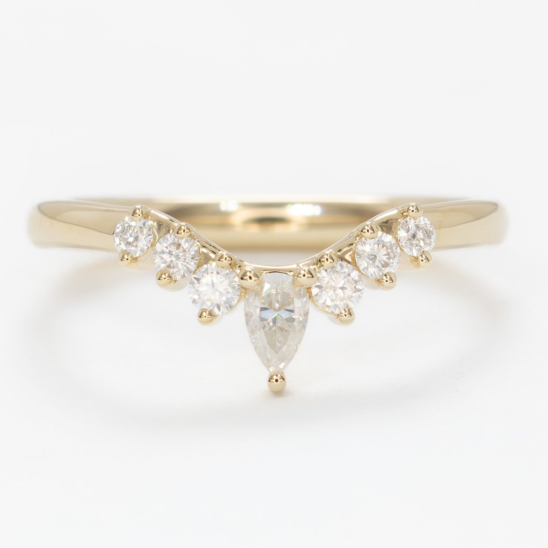 fia contour wedding band in yellow gold with moissanites