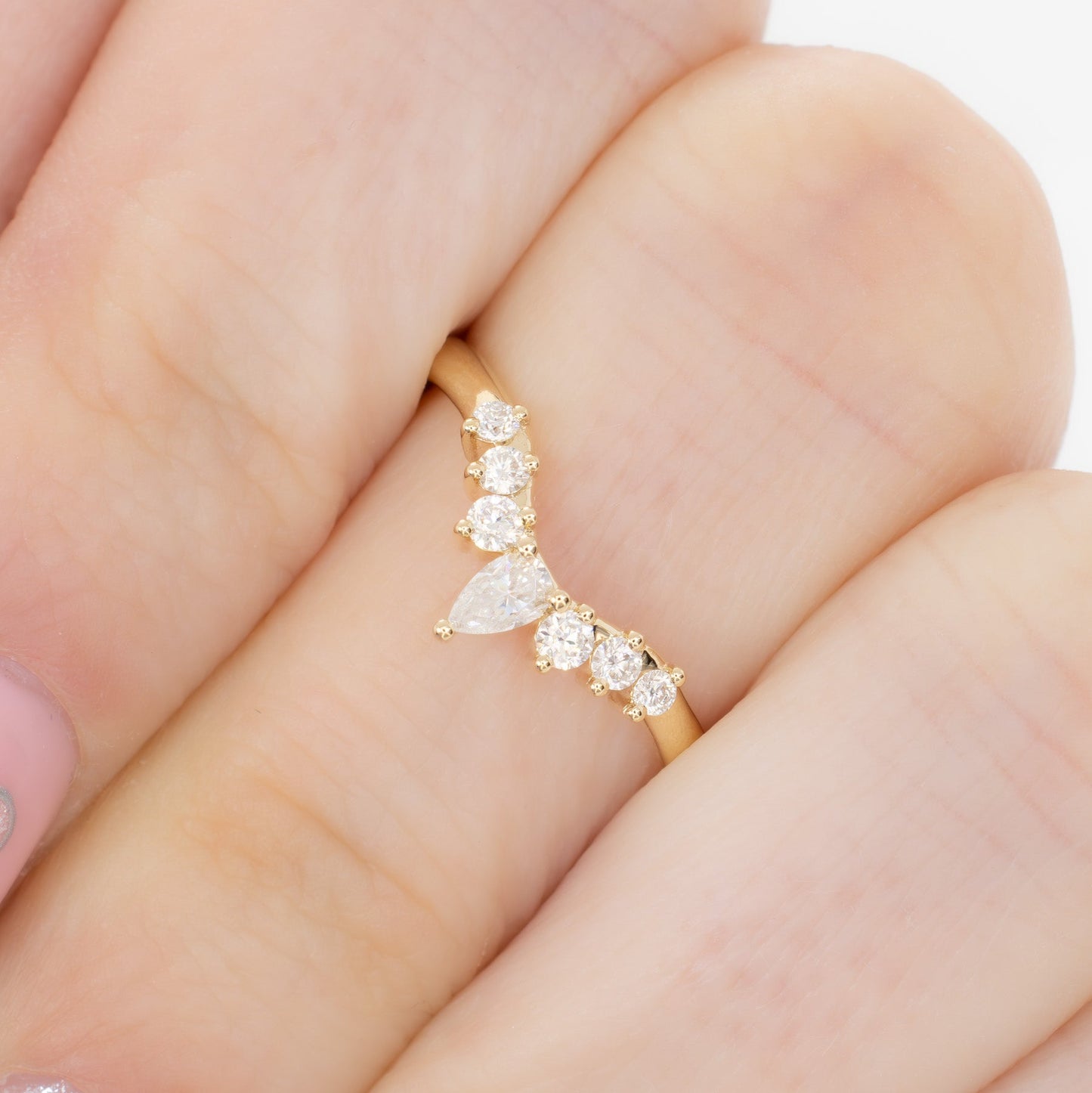 fia contour wedding band in yellow gold with moissanites