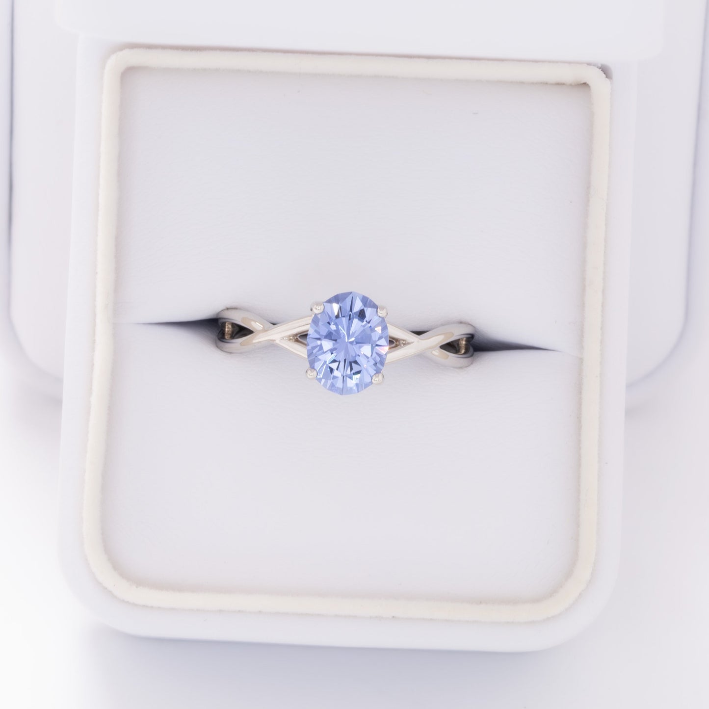 fifer engagement ring in white gold with blue oval lab sapphire