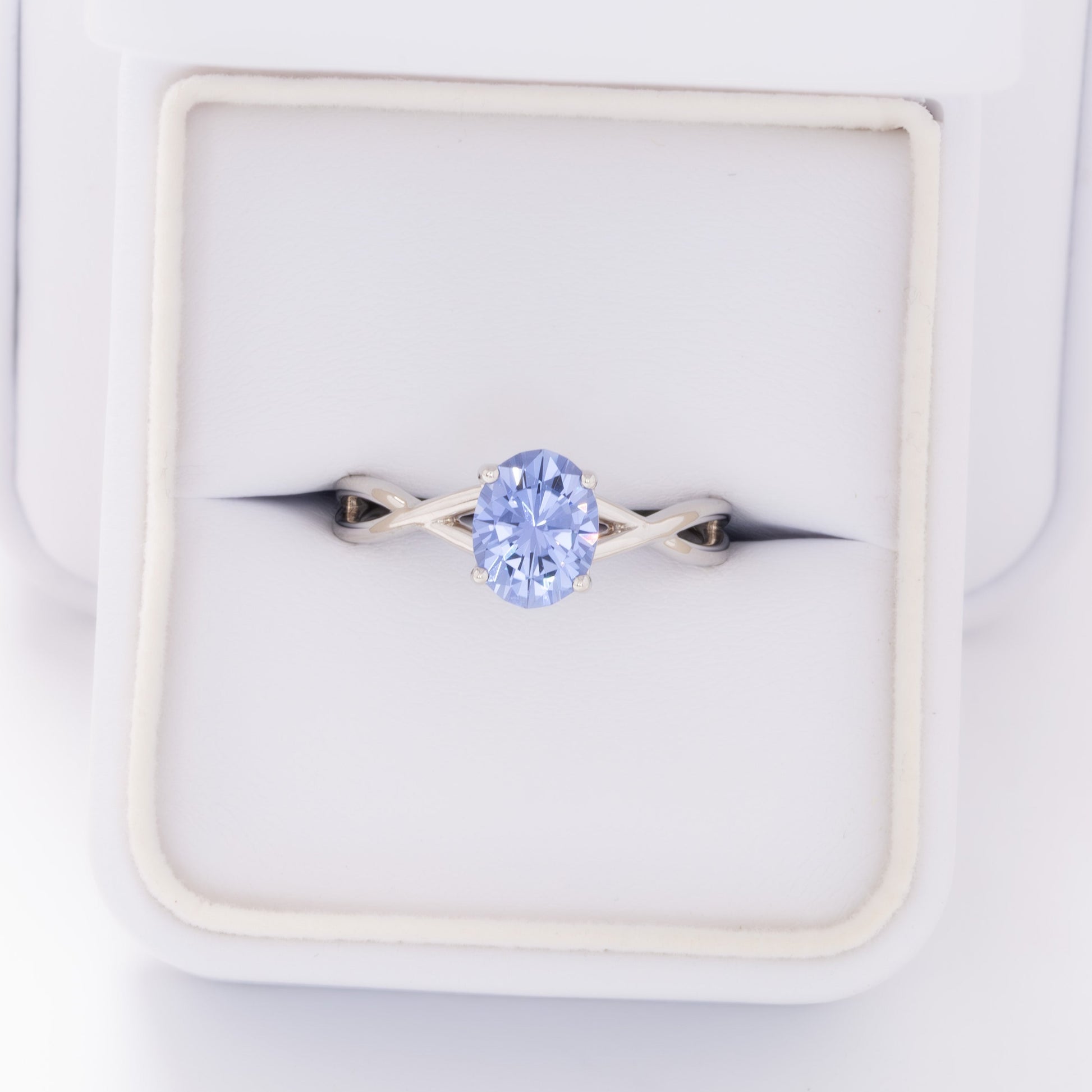 fifer engagement ring in white gold with blue oval lab sapphire