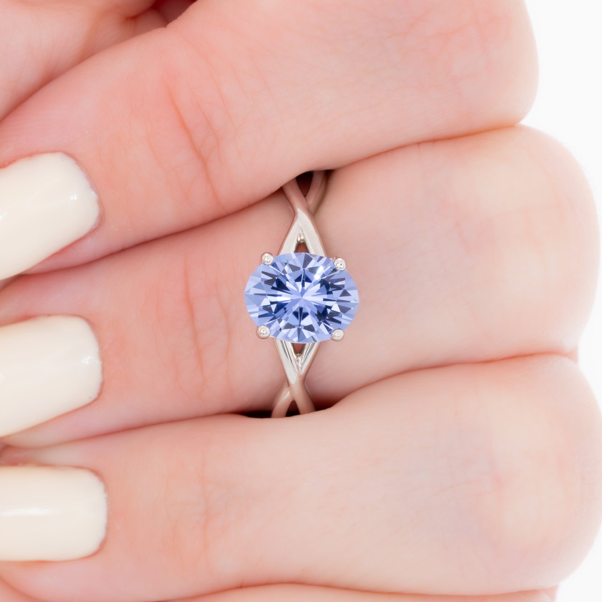 fifer engagement ring in white gold with blue oval lab sapphire