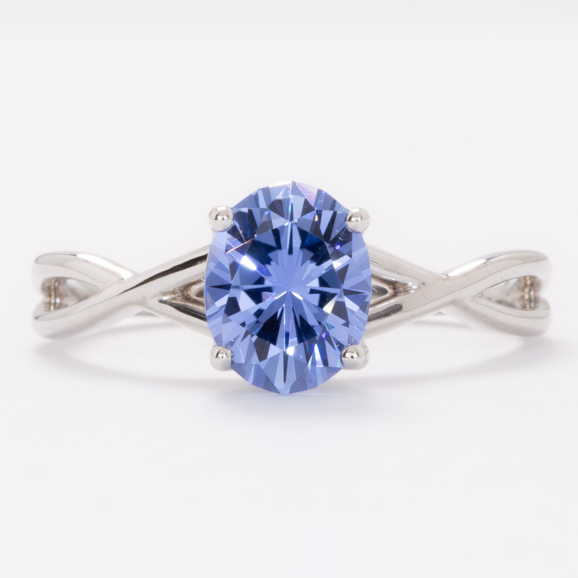 fifer engagement ring in white gold with blue oval lab sapphire