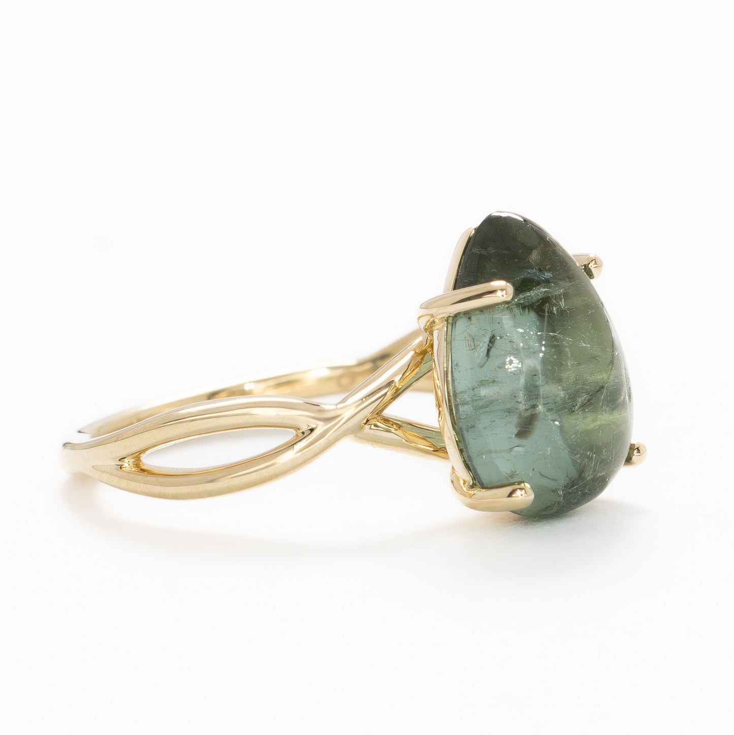 fifer solitaire ring with green tourmaline pear cabochon in yellow gold