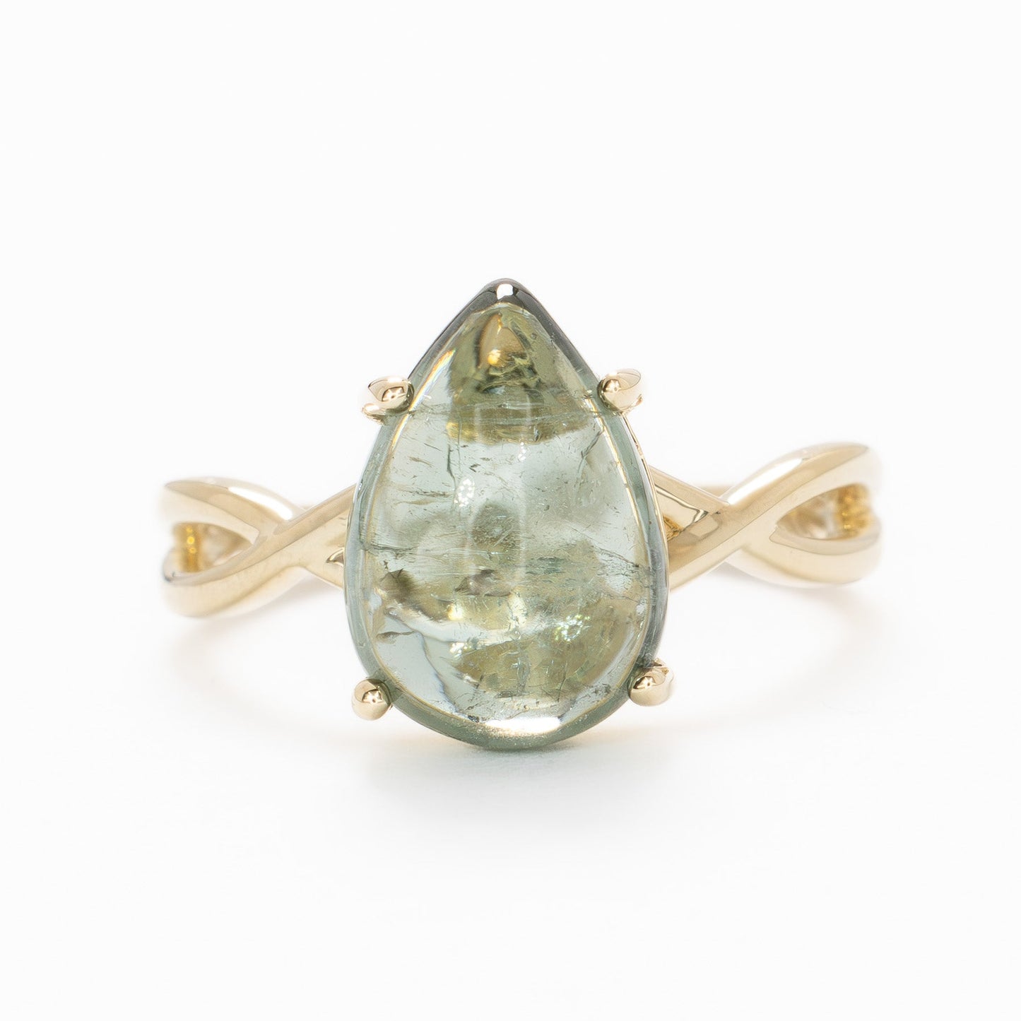 fifer solitaire ring with green tourmaline pear cabochon in yellow gold