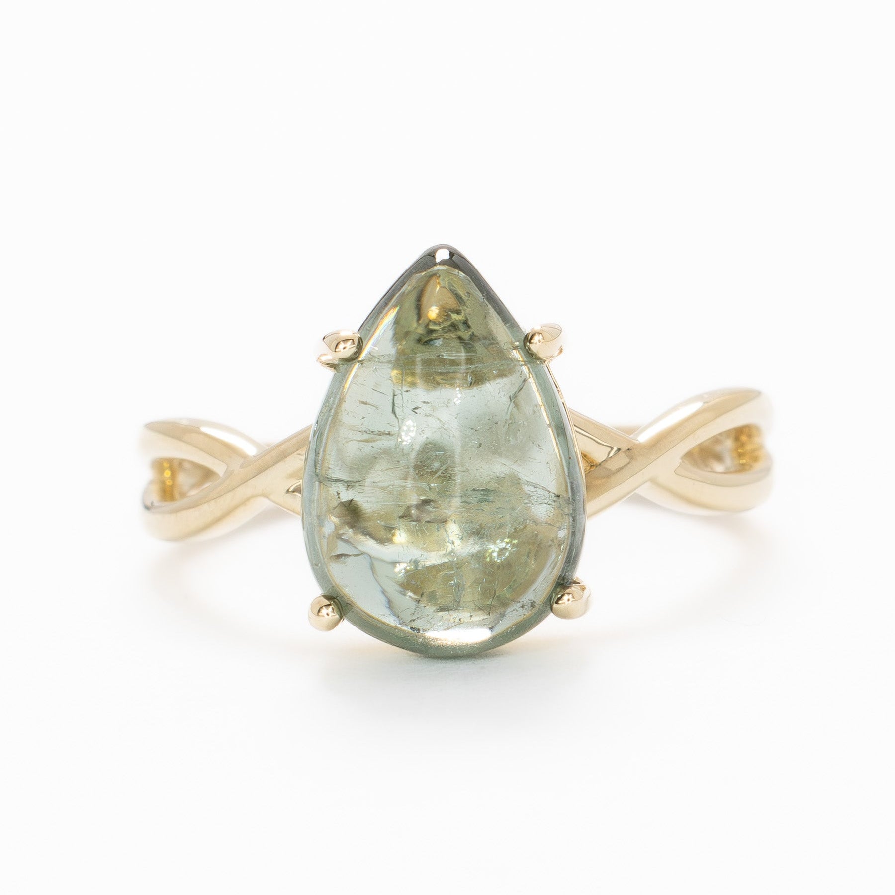 fifer solitaire ring with green tourmaline pear cabochon in yellow gold