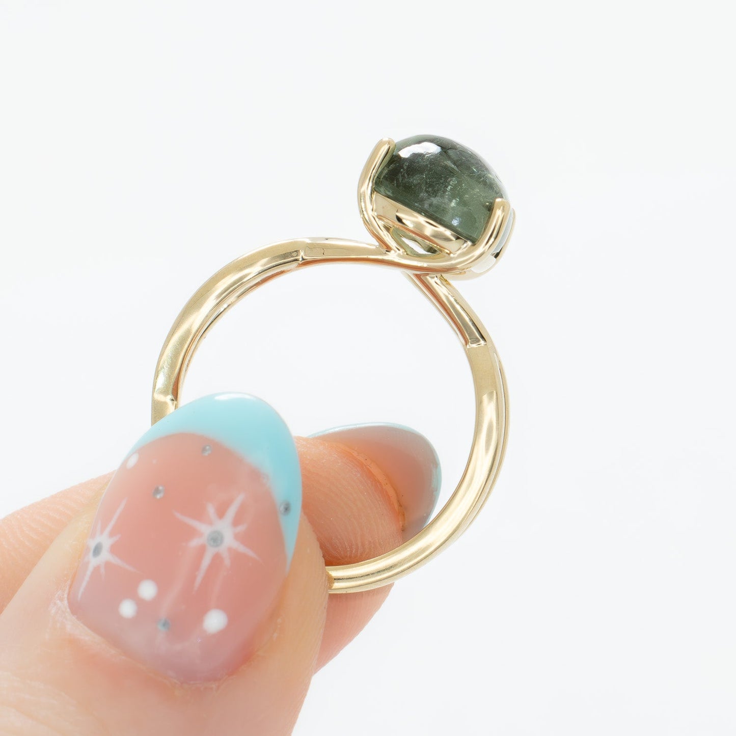 fifer solitaire ring with green tourmaline pear cabochon in yellow gold
