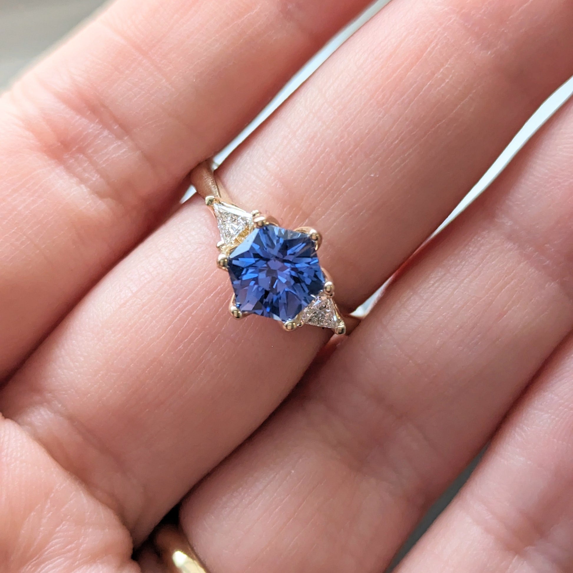 fiona three stone ring with hex blue lab sapphire