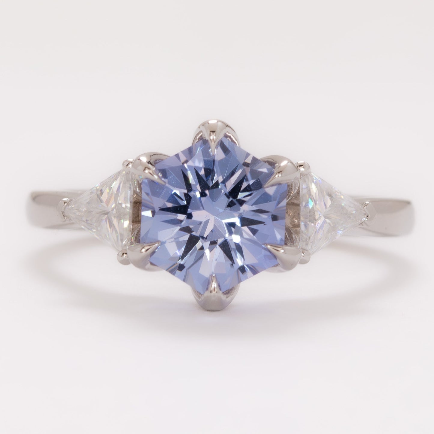 fiona engagement ring with hex cut light blue lab sapphire