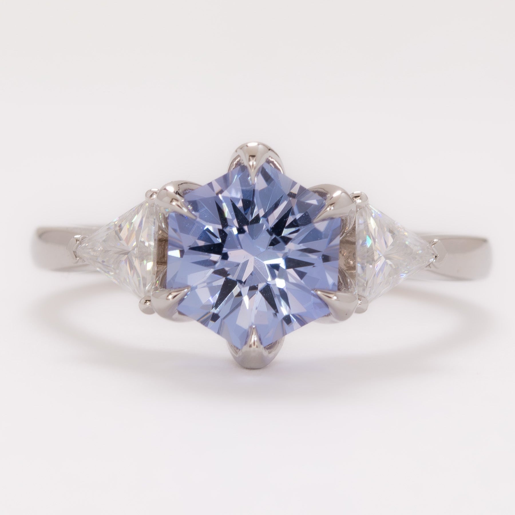 fiona engagement ring with hex cut light blue lab sapphire