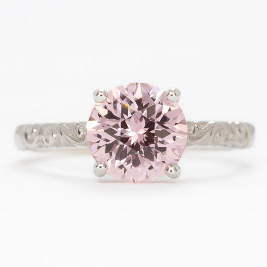 fleur nature inspired solitaire engagement ring with pink lab sapphire round