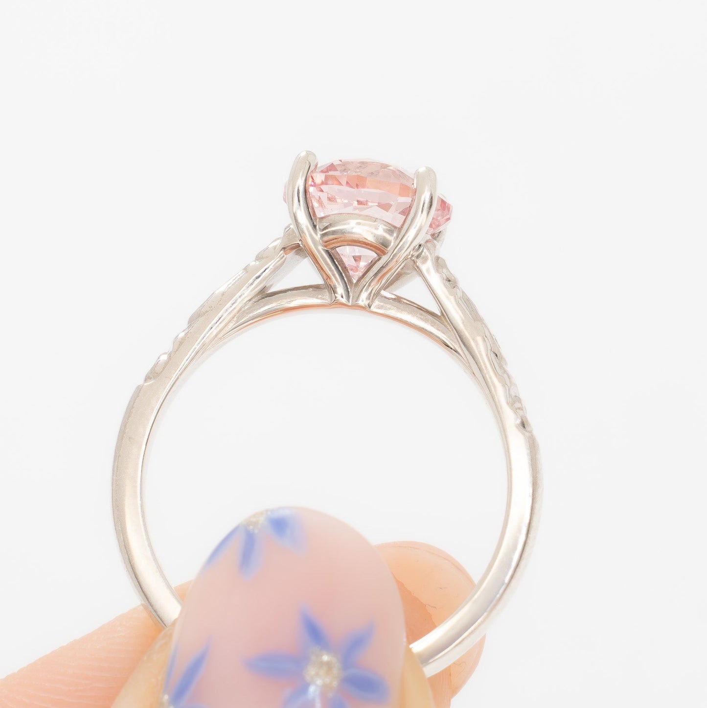 fleur nature inspired solitaire engagement ring with pink lab sapphire round
