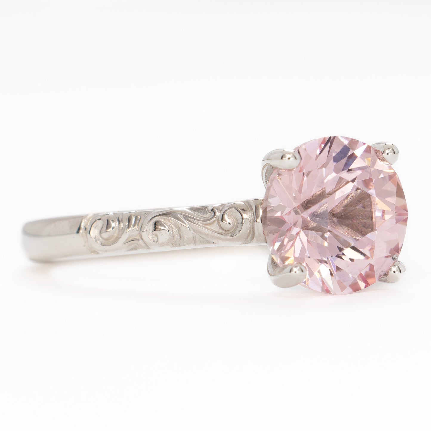 fleur nature inspired solitaire engagement ring with pink lab sapphire round