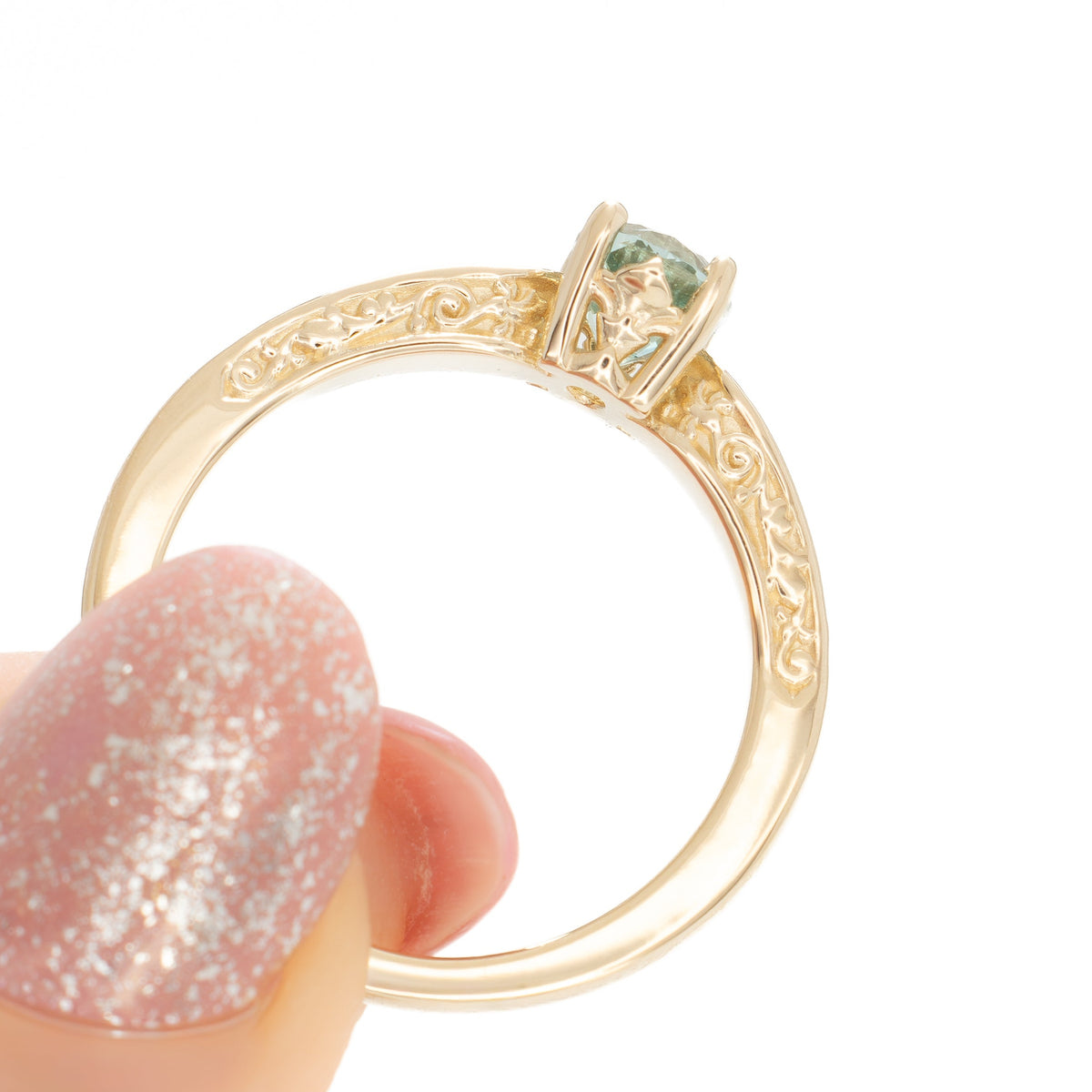 flora nature inspired ring in yellow gold with light green lab sapphire oval