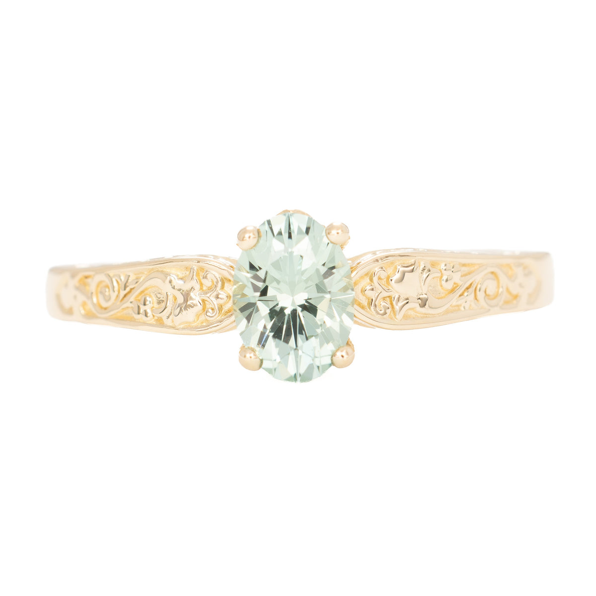flora nature inspired ring in yellow gold with light green lab sapphire oval