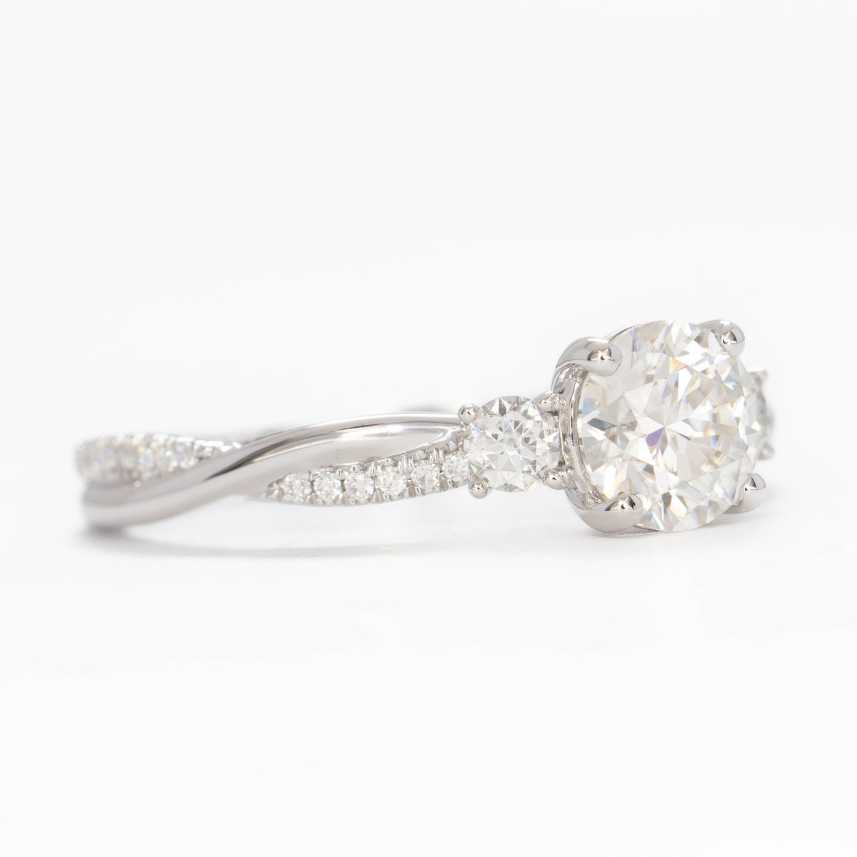 giselle accented three stone ring in white gold with round lab diamond
