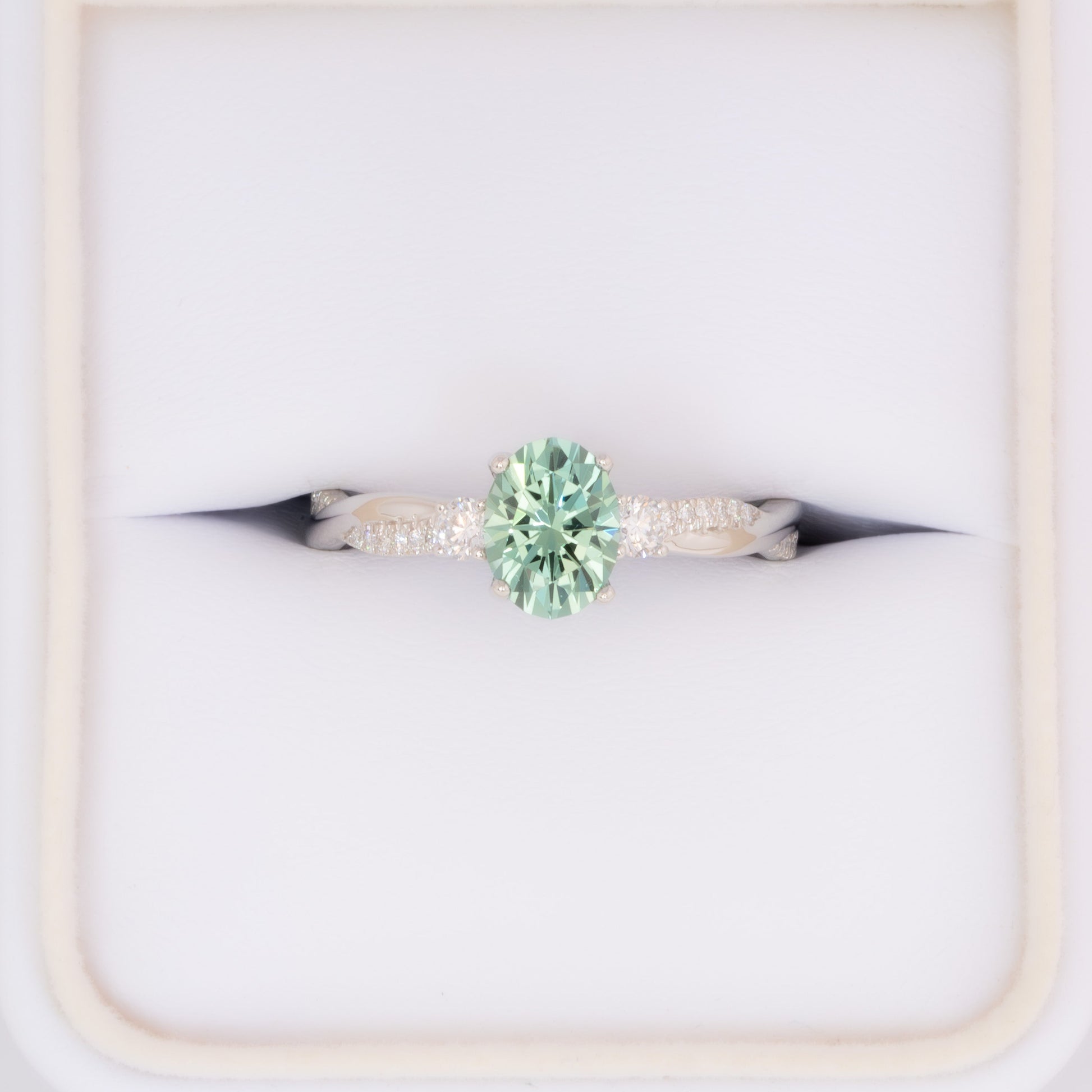 giselle three stone ring with oval green lab sapphire