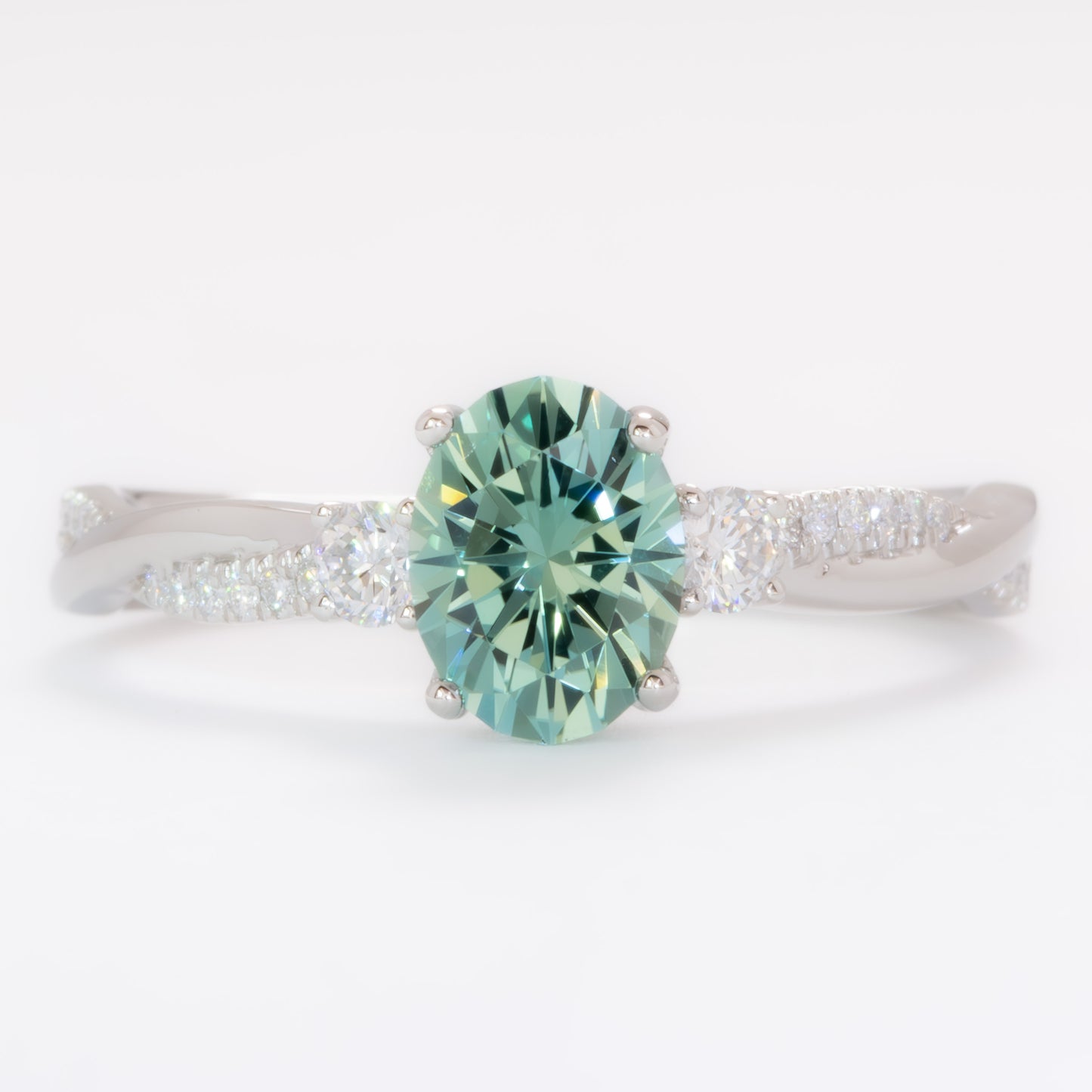 giselle three stone ring with oval green lab sapphire