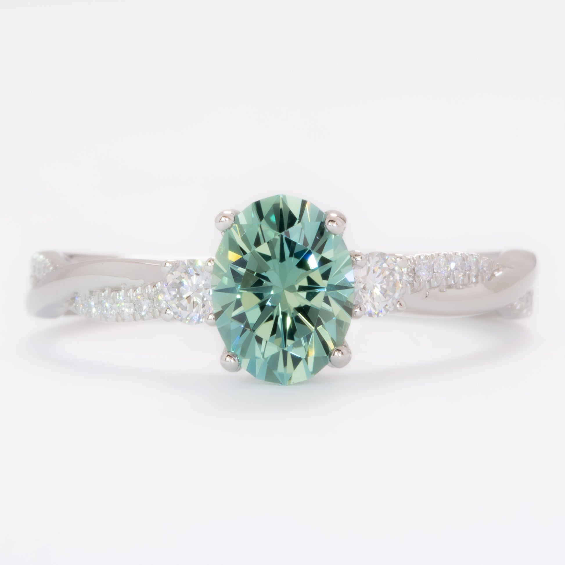 giselle three stone ring with oval green lab sapphire