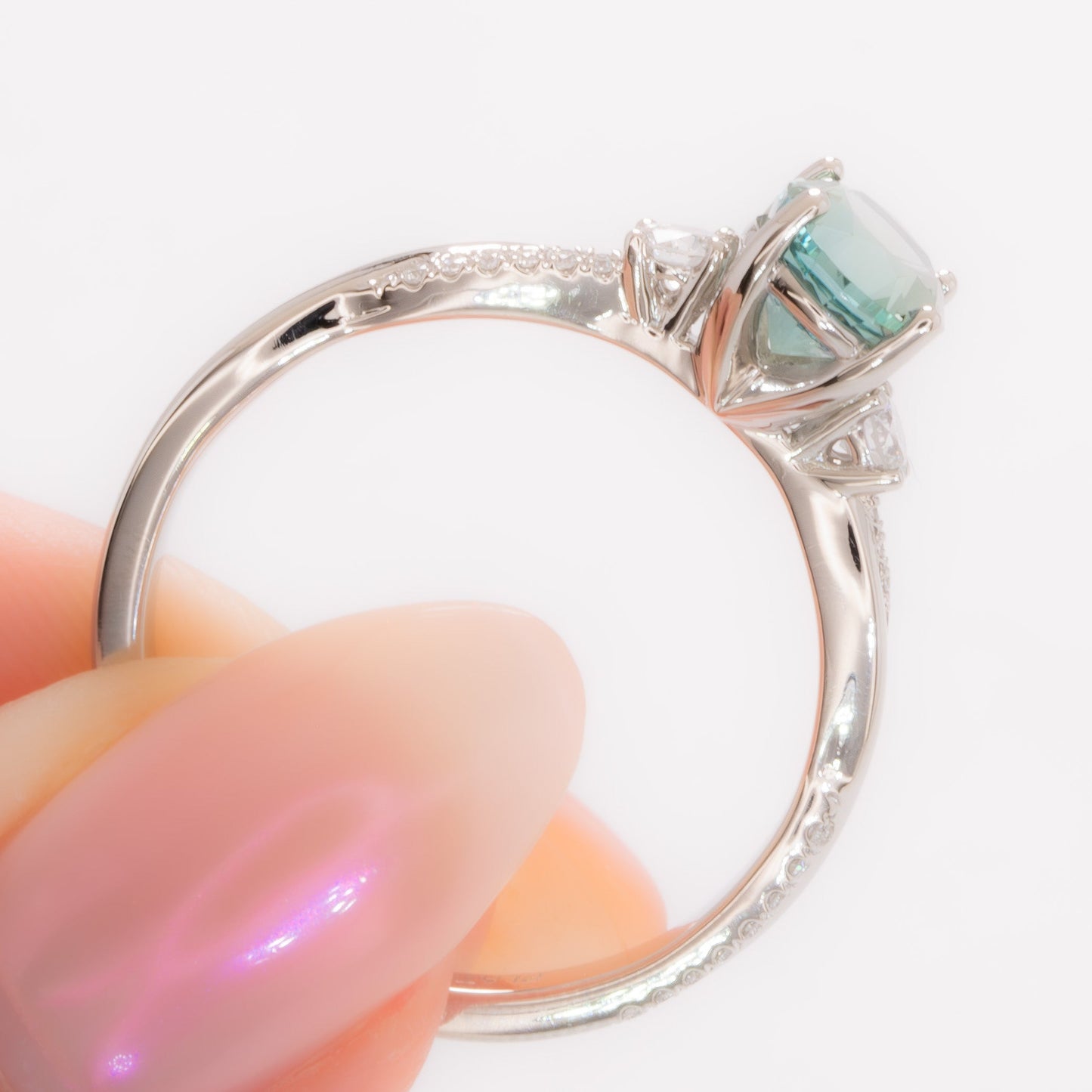 giselle three stone ring with oval green lab sapphire