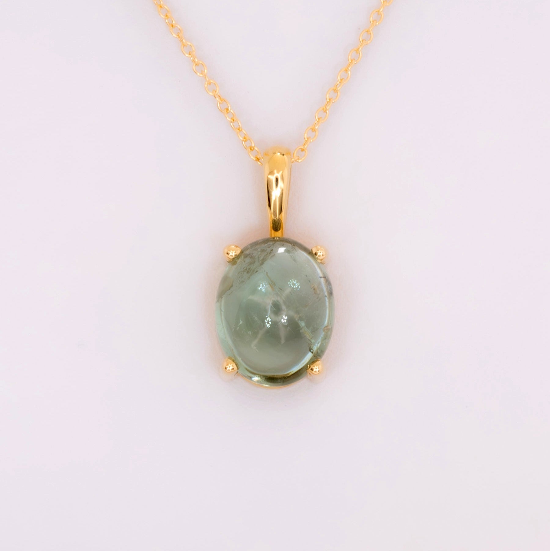 green tourmaline oval cabochon necklace in yellow gold