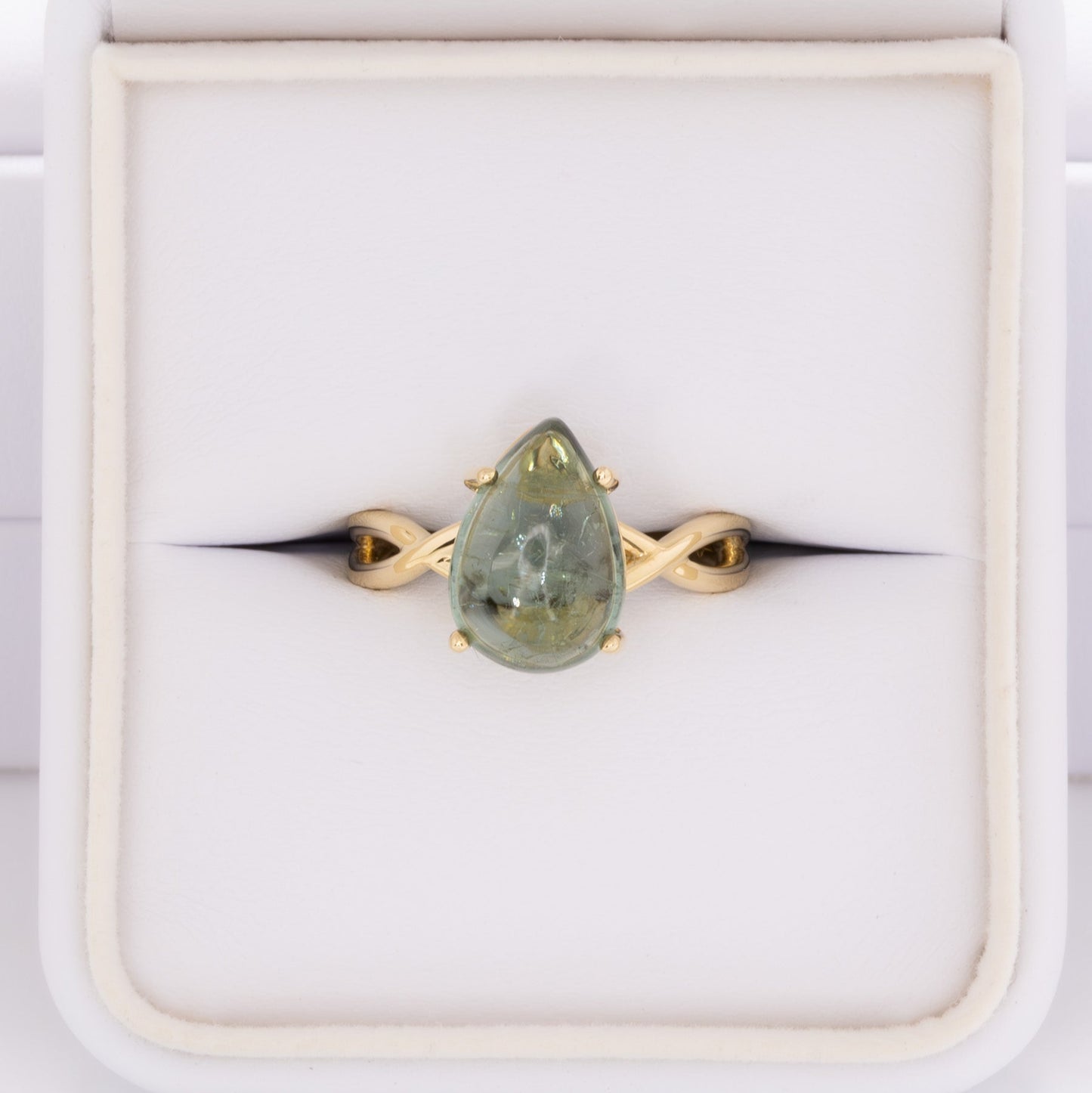 green tourmaline pear cabochon ring