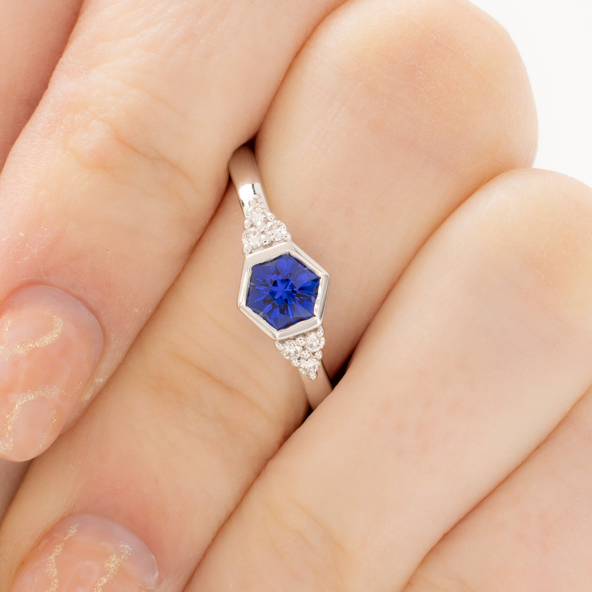 hanna bezel accented ring in white gold with royal blue lab sapphire hex