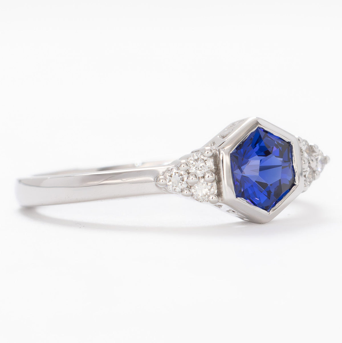 hanna bezel accented ring in white gold with royal blue lab sapphire hex