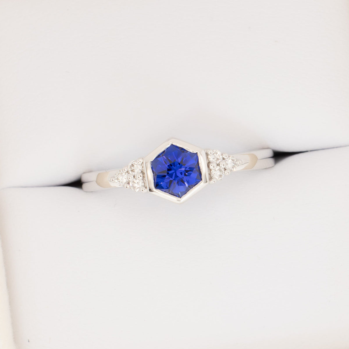 hanna bezel accented ring in white gold with royal blue lab sapphire hex