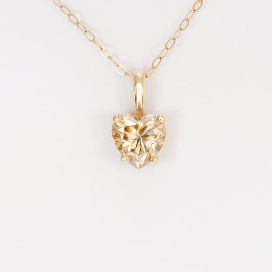 heart necklace in yellow gold with heart champagne moissanite