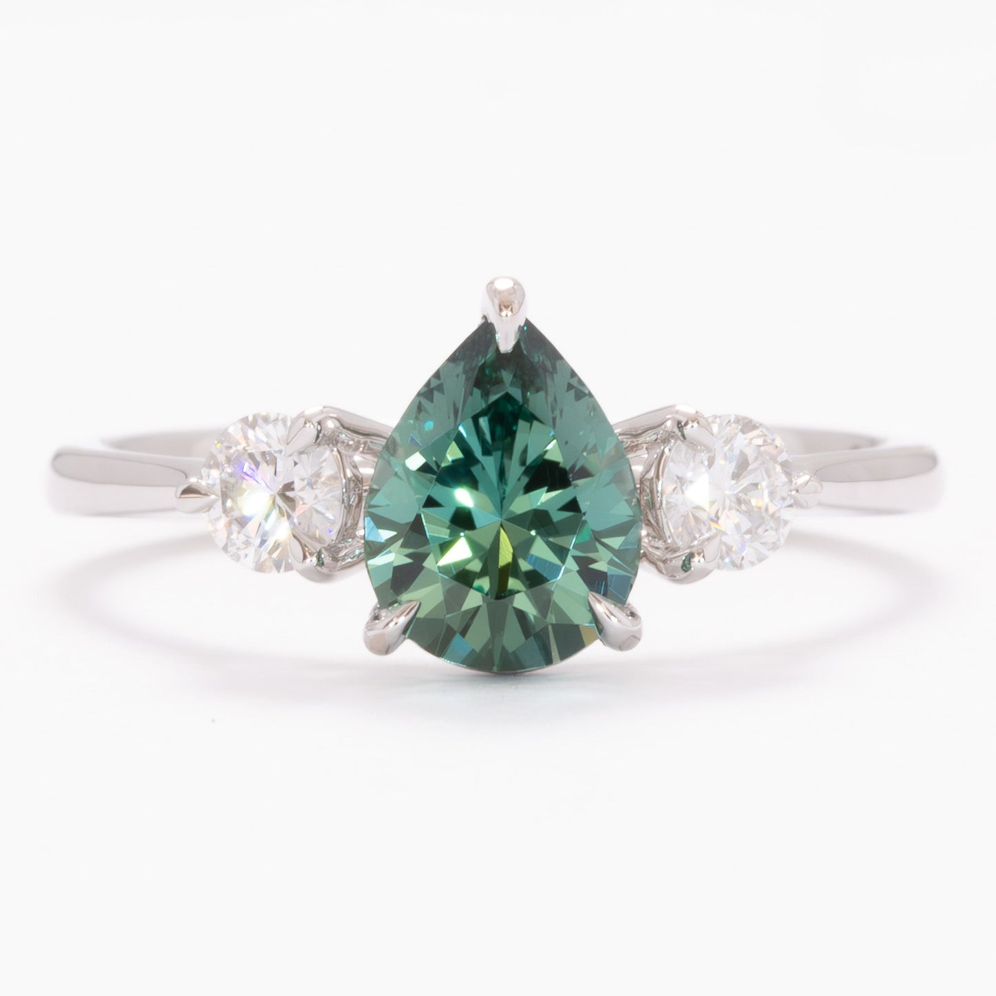 inara three stone ring in white gold with pear green lab sapphire