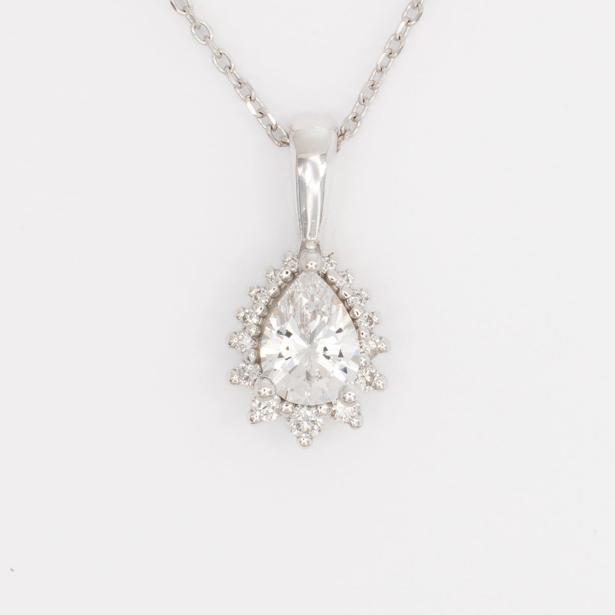 ivory necklace in white gold with pear white lab sapphire