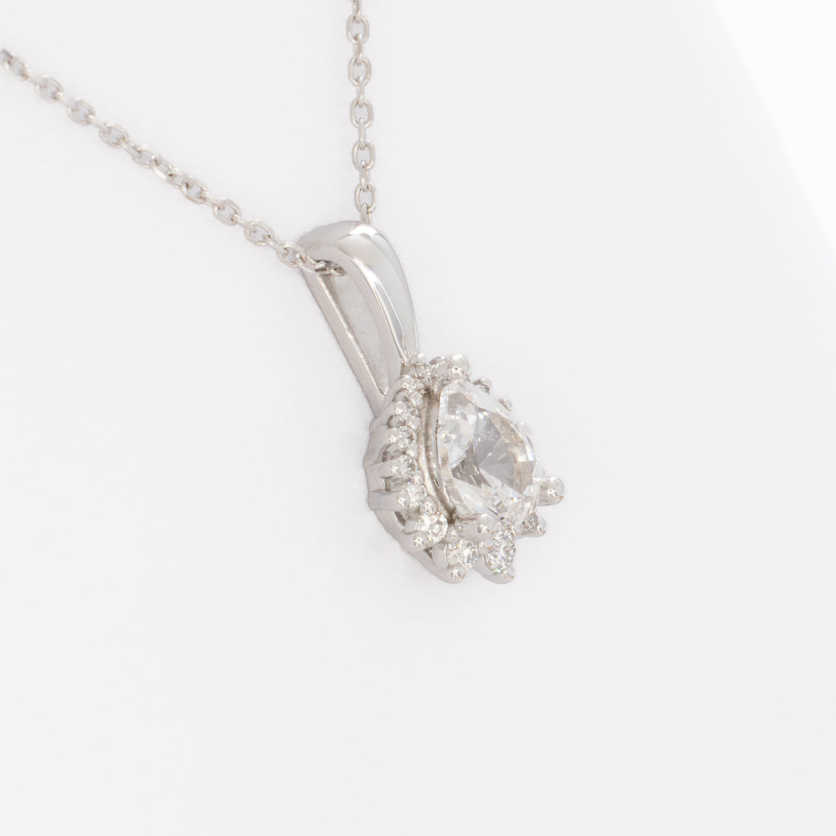 ivory necklace in white gold with pear white lab sapphire
