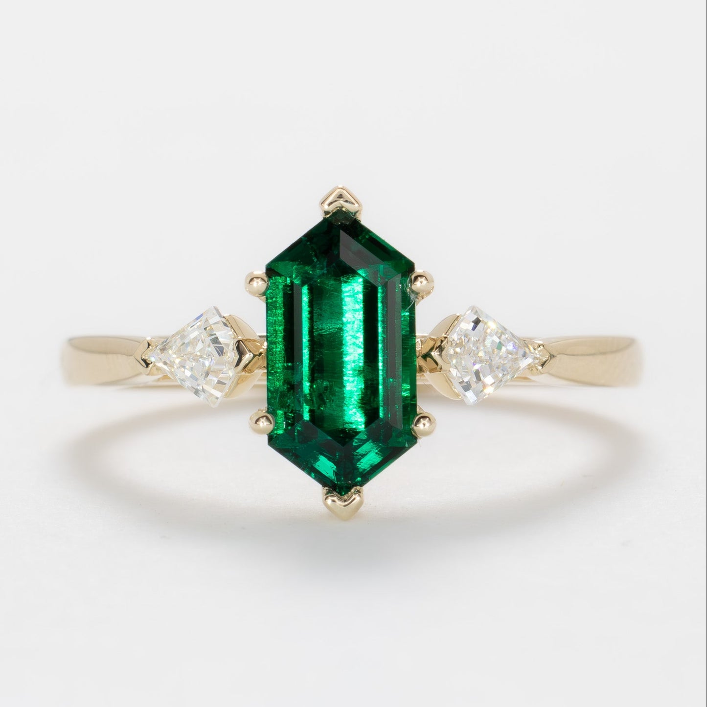 jamie three stone ring with dutch marquise lab emerald
