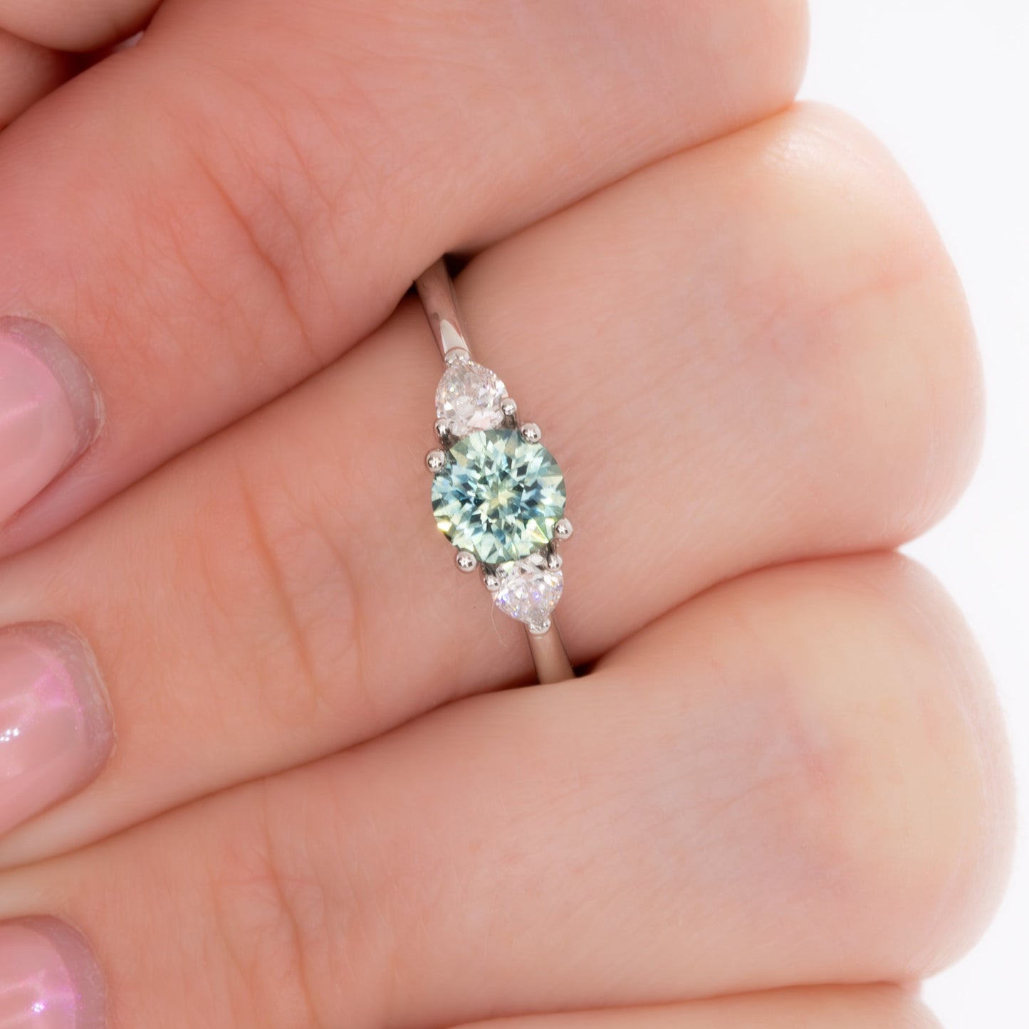 josie three stone engagement ring with round montana sapphire