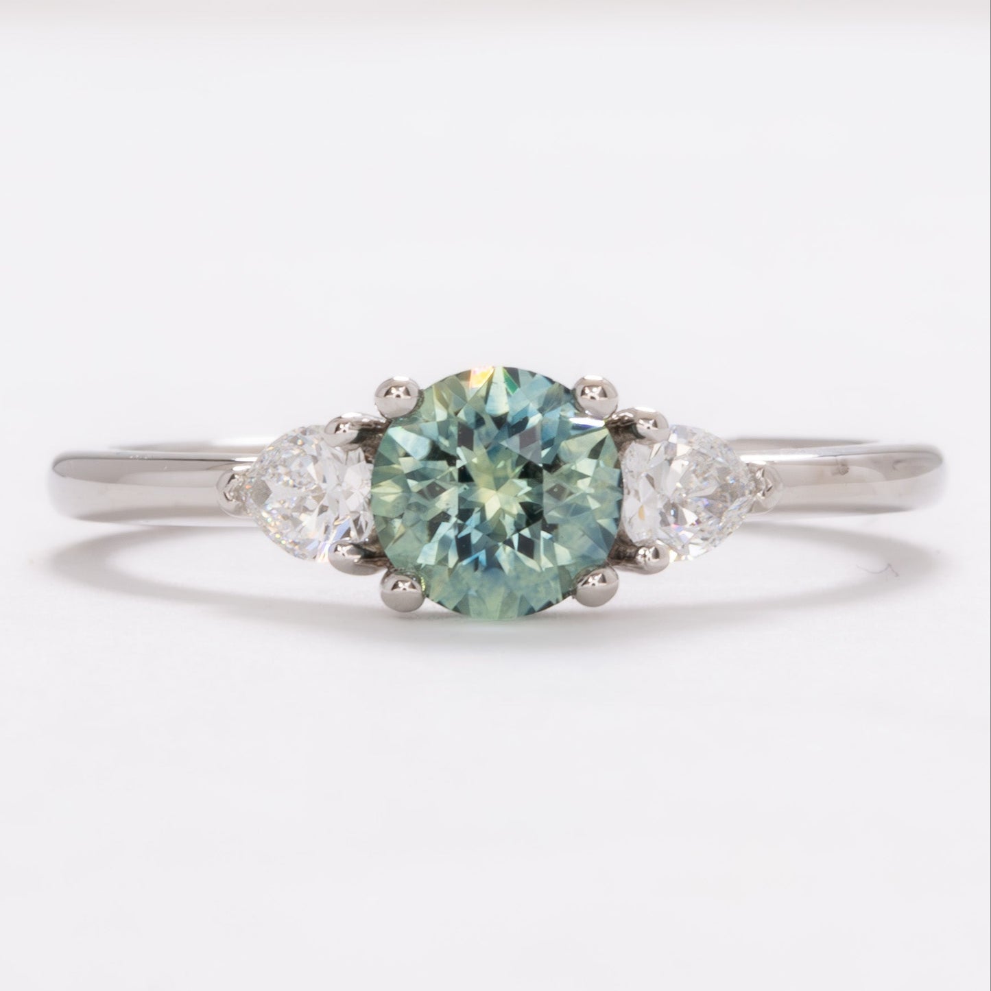 josie three stone engagement ring with round montana sapphire