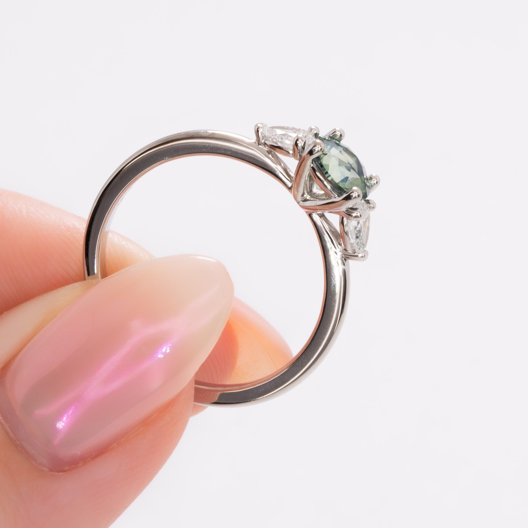 josie three stone engagement ring with round montana sapphire