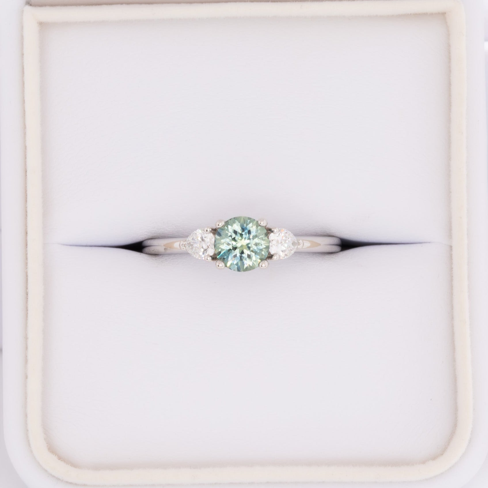 josie three stone engagement ring with round montana sapphire