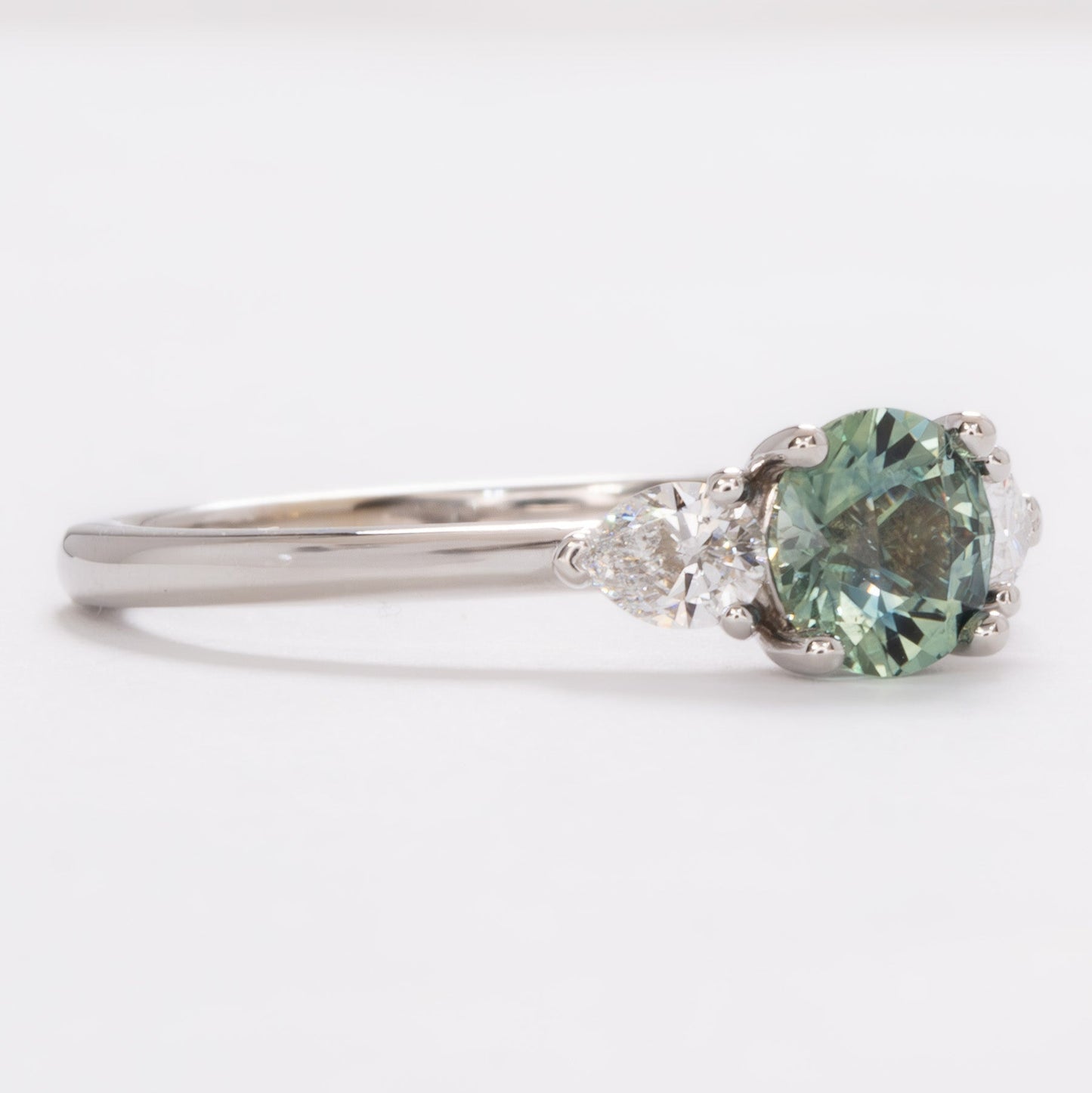 josie three stone engagement ring with round montana sapphire