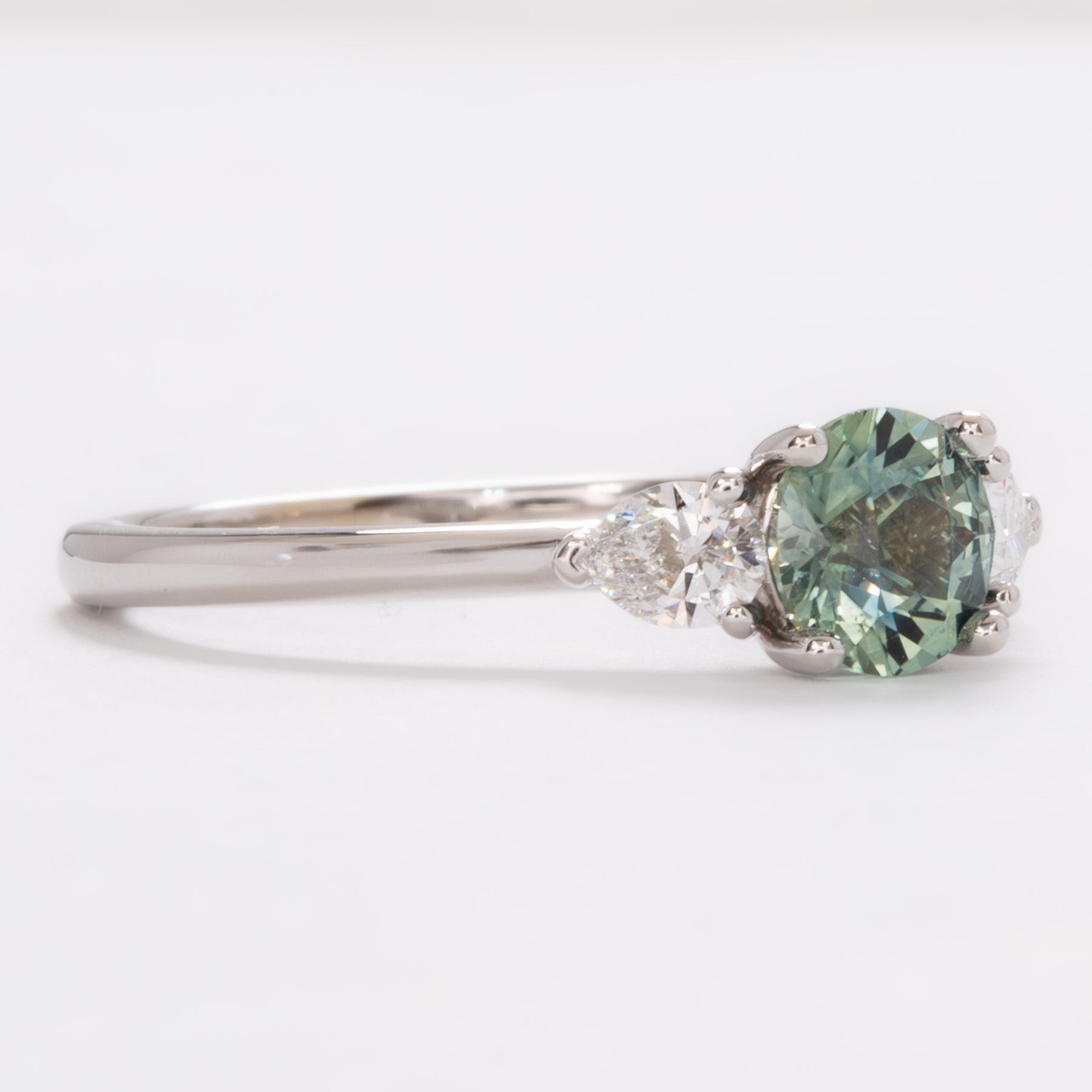 josie three stone engagement ring with round montana sapphire