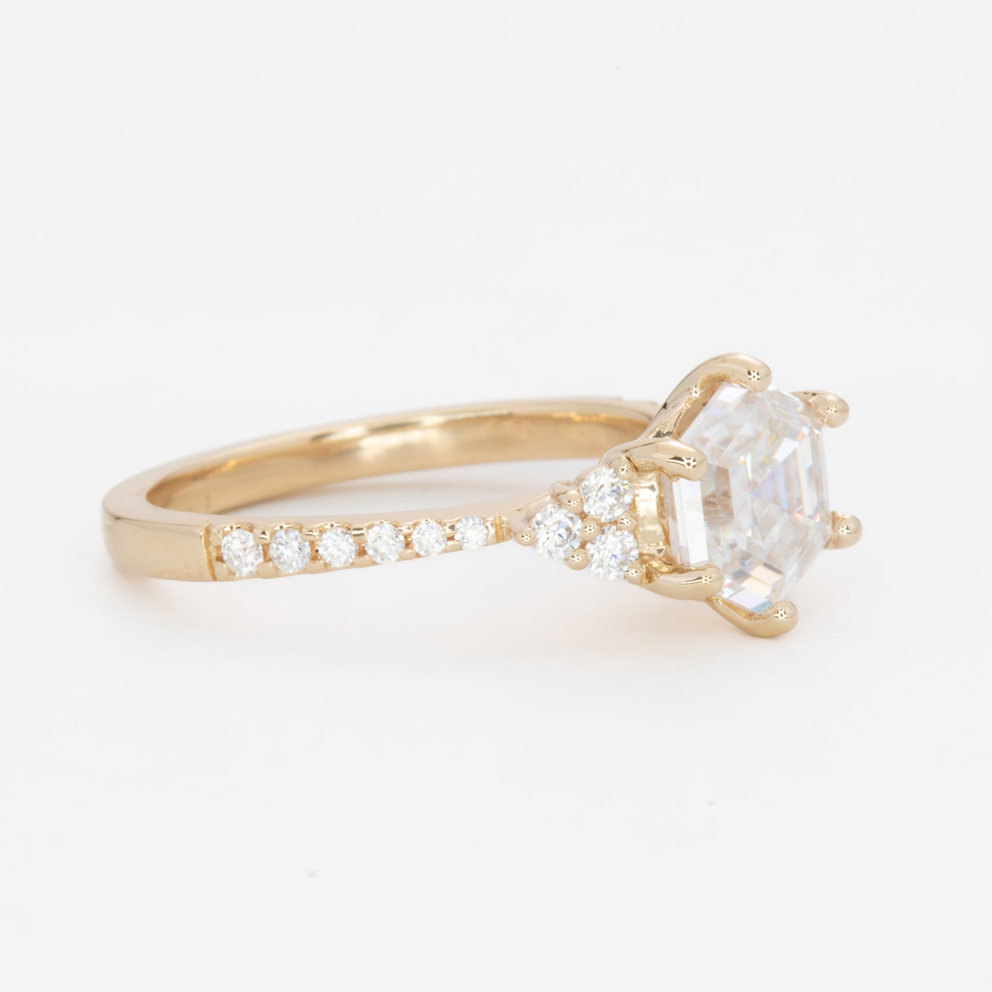 juliette engagement ring with yellow gold and hex cut moissanite 