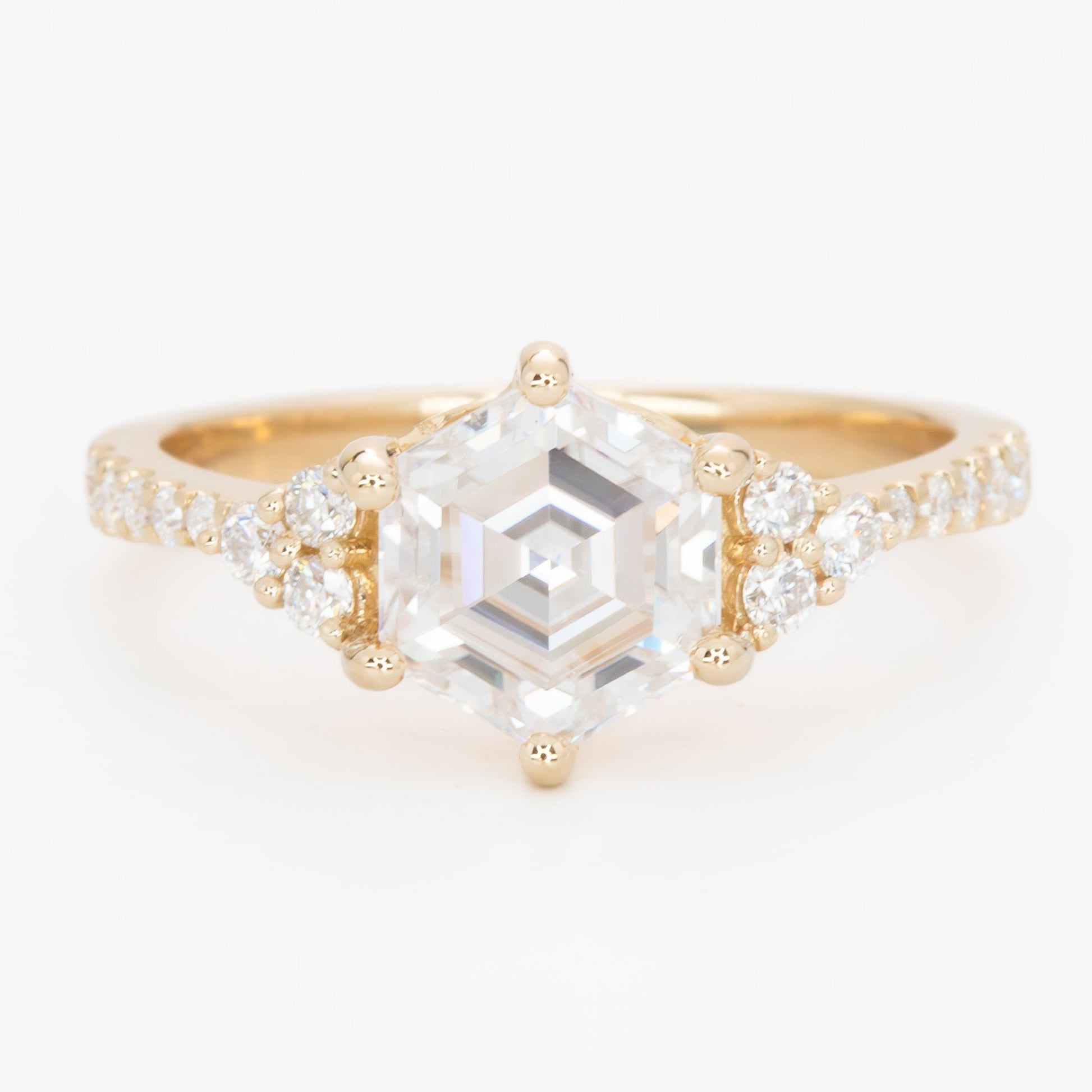 juliette engagement ring with yellow gold and hex cut moissanite 