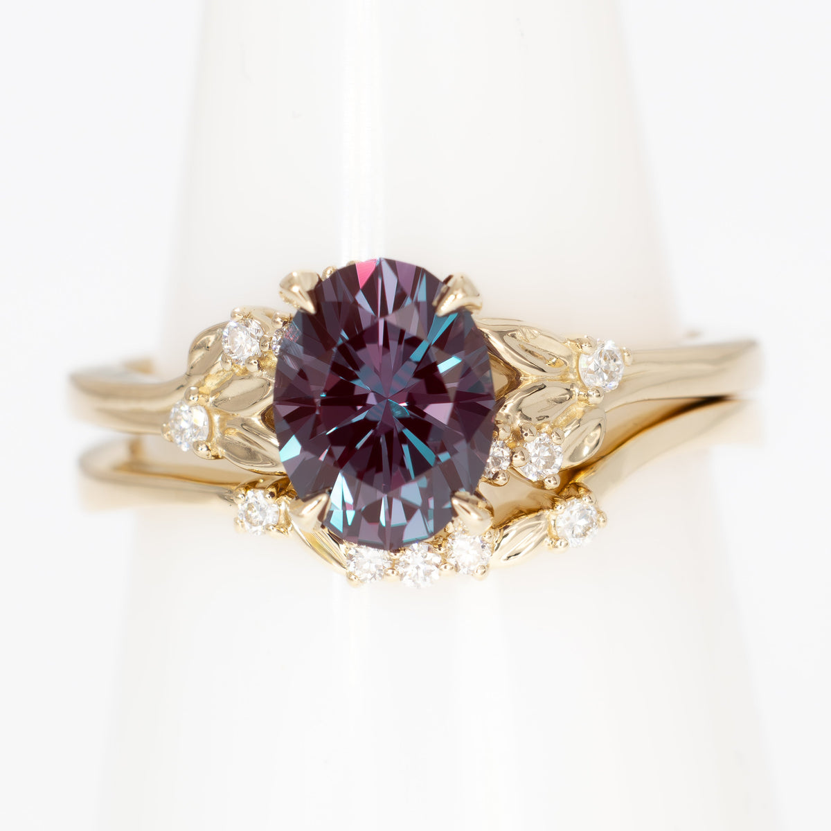 kinsley nature inspired wedding set in yellow gold with oval lab alexandrite
